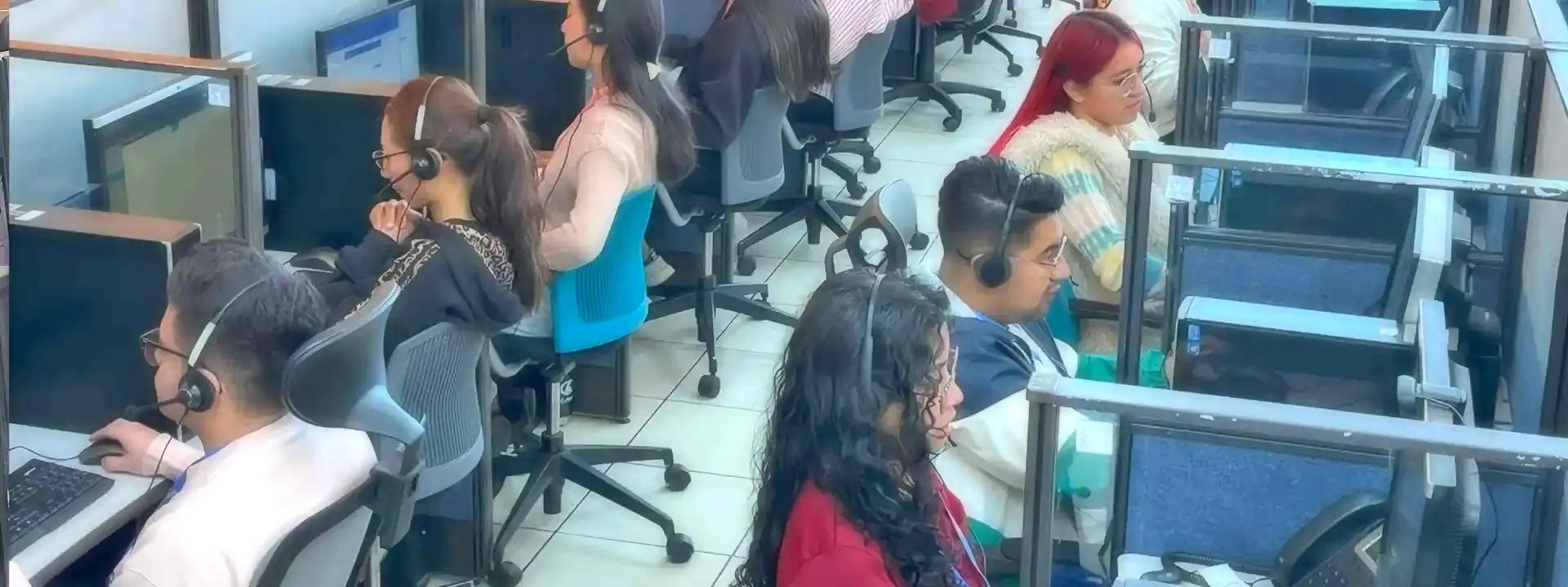 Rows of agents serving customers at one of our Guatemala sites